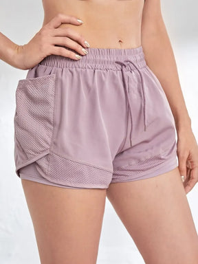 Shorts esportivos com bolsos