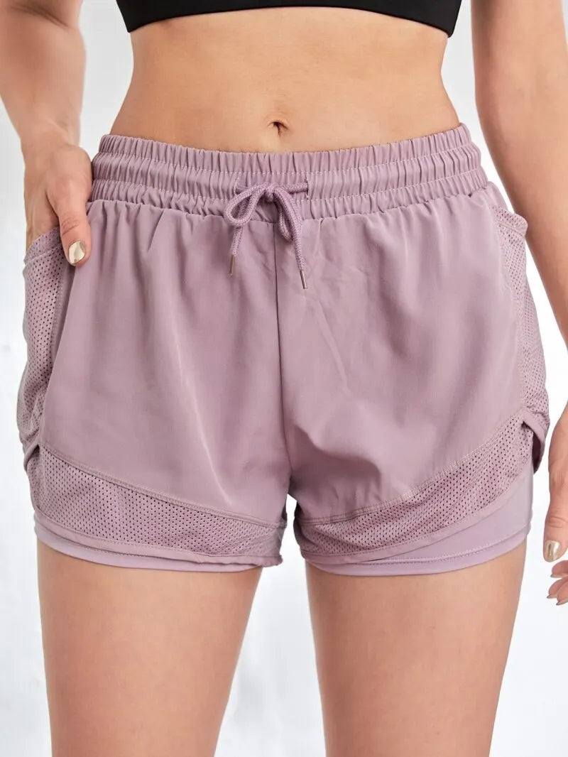 Shorts esportivos com bolsos